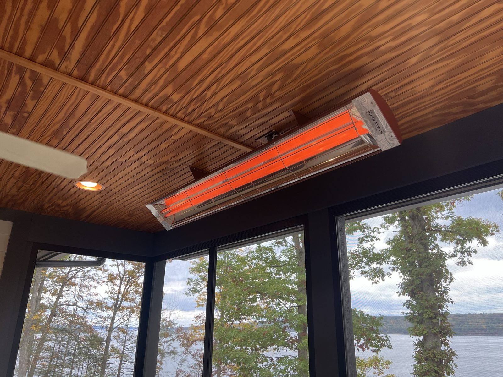 Dual Infratech radiant heaters on a covered lakeside porch